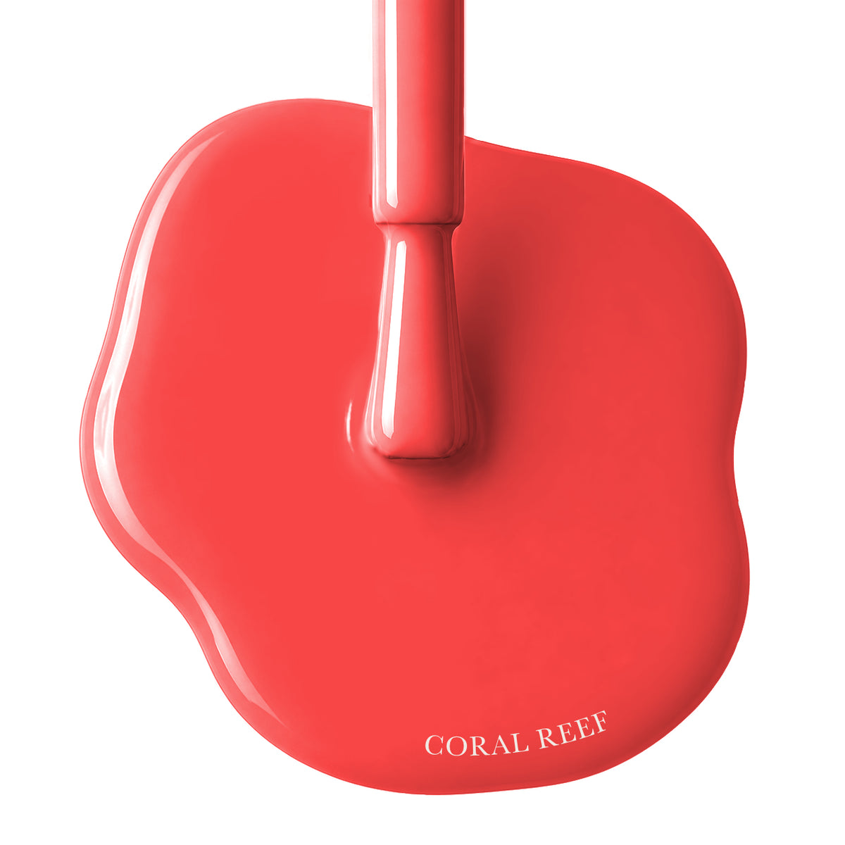 A glossy coral-red nail polish smear with the brush applicator resting vertically in the center, and the text 'CORAL REEF' printed near the bottom on a white background.