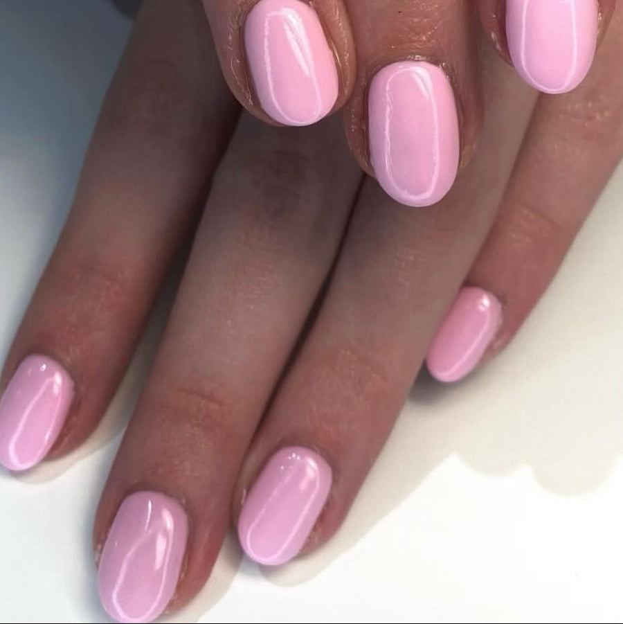 Pale pink gel polish on nail set 