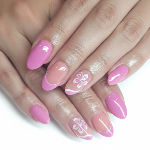 Hand with pink and white floral nail designs.