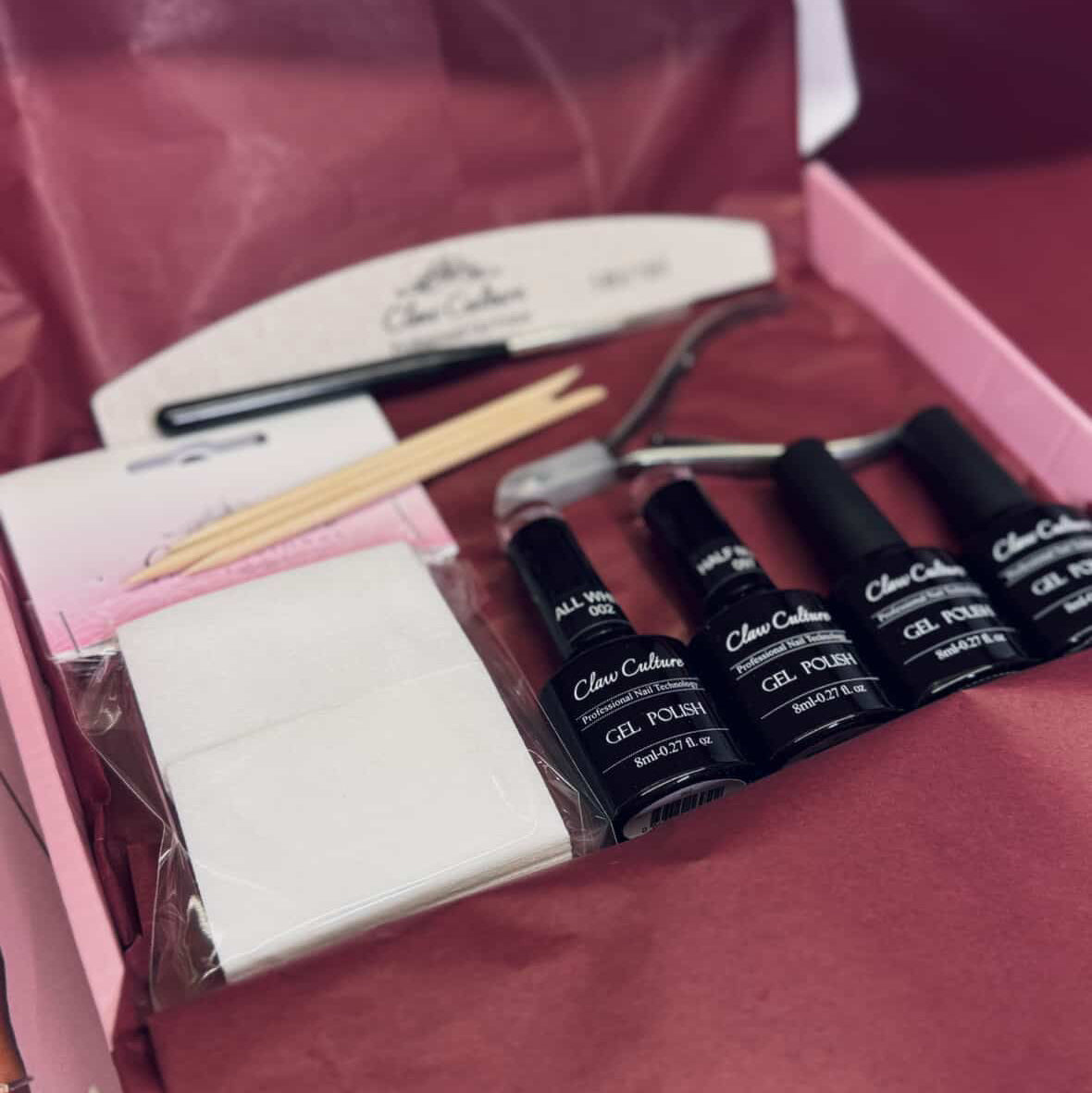 Claw Drop Box with gel polishes and tools 