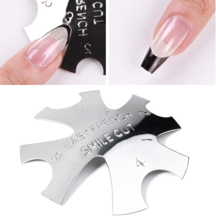 Nail art tool with 'Easy French Smile Cut' text, held by a hand with pink nail polish.