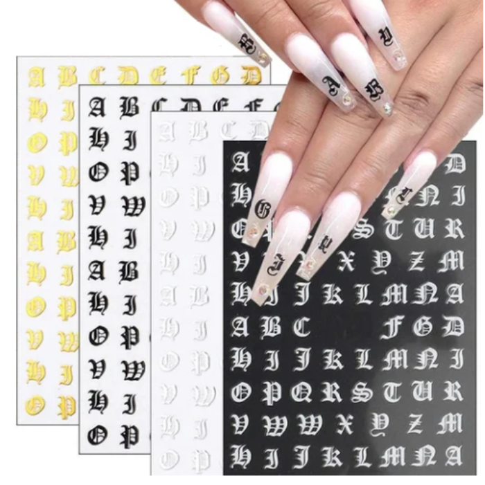 Nail art stickers with letters and numbers on a white background