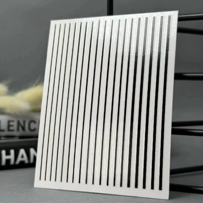 Metallic black vertical stripes on a blurred background