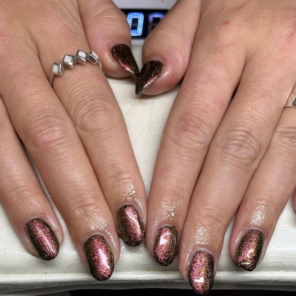 A sparkly gel polish on nails 