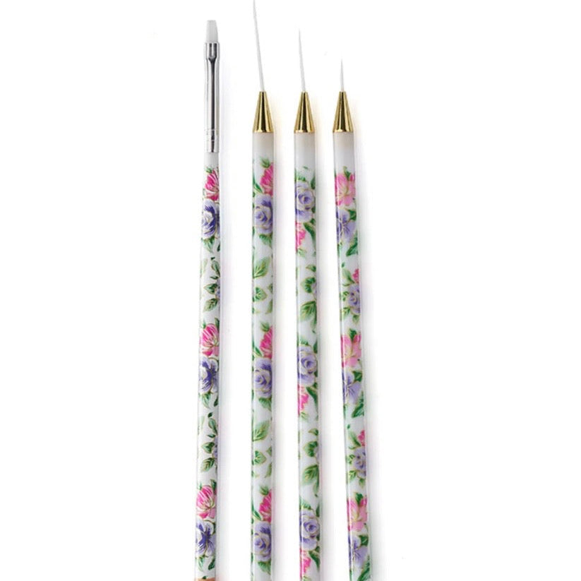 4 nail art brushes with floral design handles 