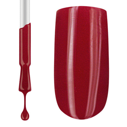 Red nail polish with applicator on a white background