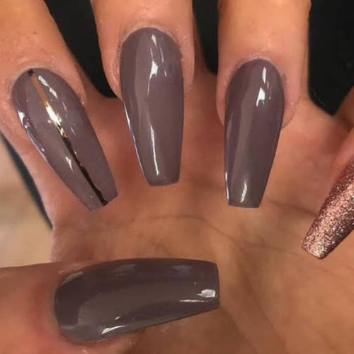 Hand with dark brown nail polish 