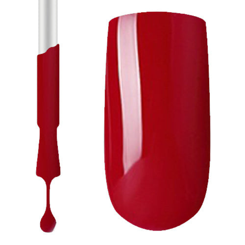 A swatch of red gel nail polish applied to a surface, showing a glossy finish.